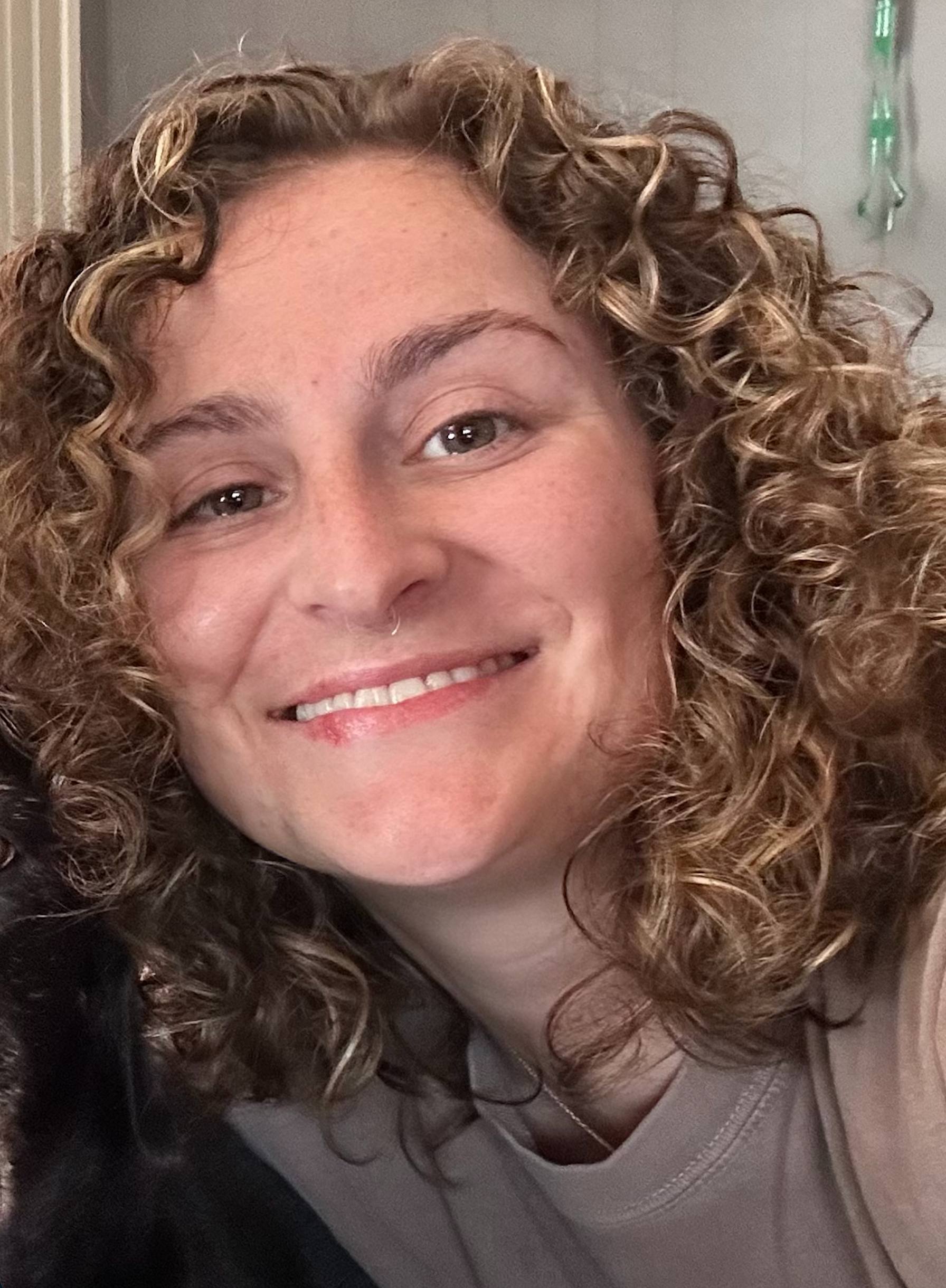 Amber Coleman, Licensed Esthetician at Bowers Chiropractic, smiling professionally
